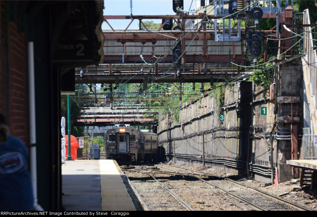 The 1: 11 PM eastbound Train Crosses over from Track 1 to Track 2